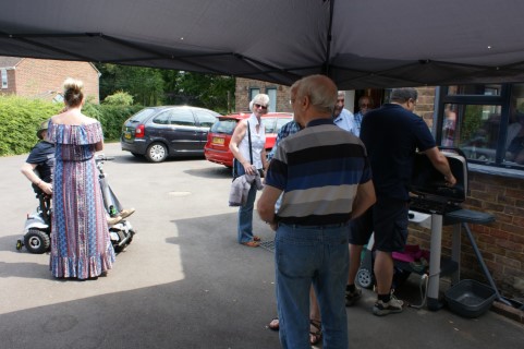 Guests arriving. BBQ setup